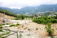 Xã Phước Đồng khó khắc phục đất đồi núi bị san ủi